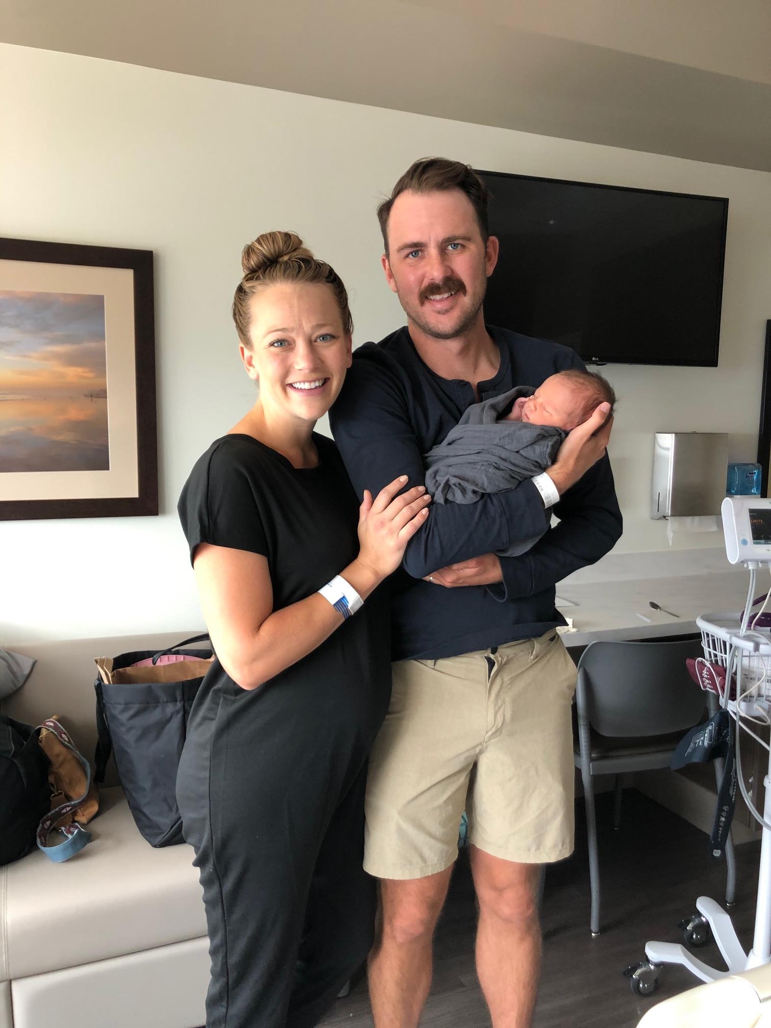 The Bloomfields with their newborn daughter, Elliot.